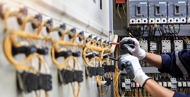 Professional Electrician technician working in Poquott, NY